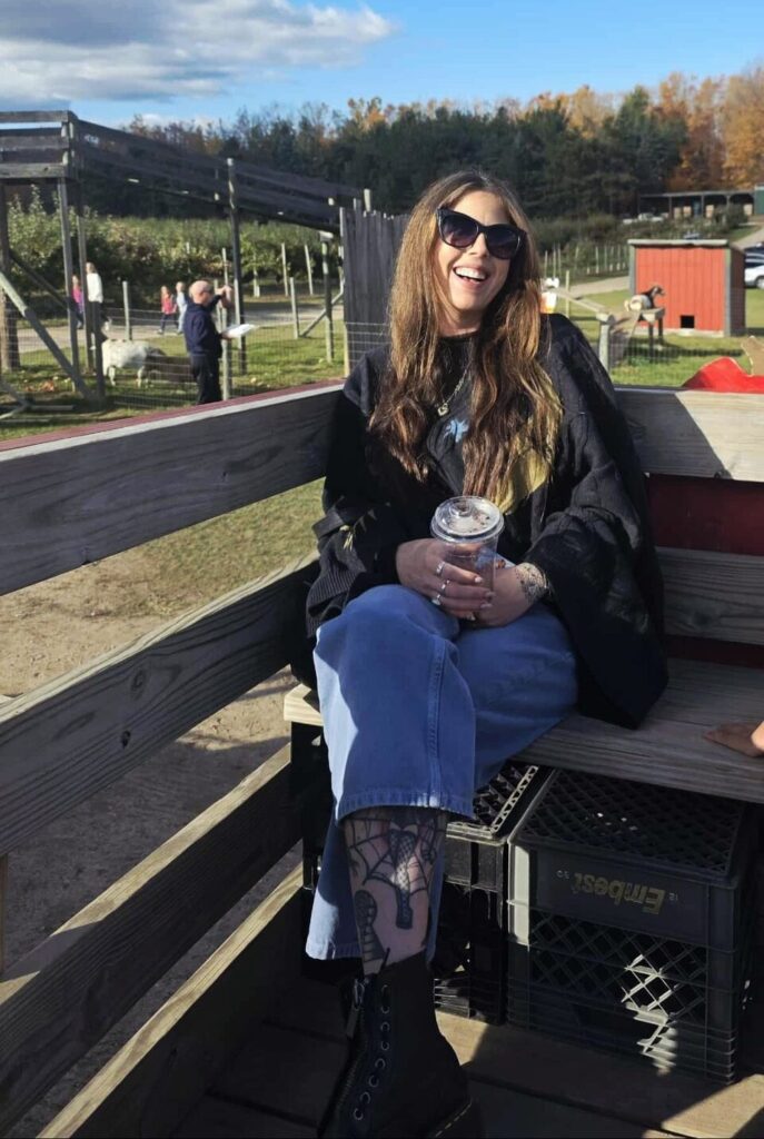 Nicole on the hayride at Knaebe's Apple Farm